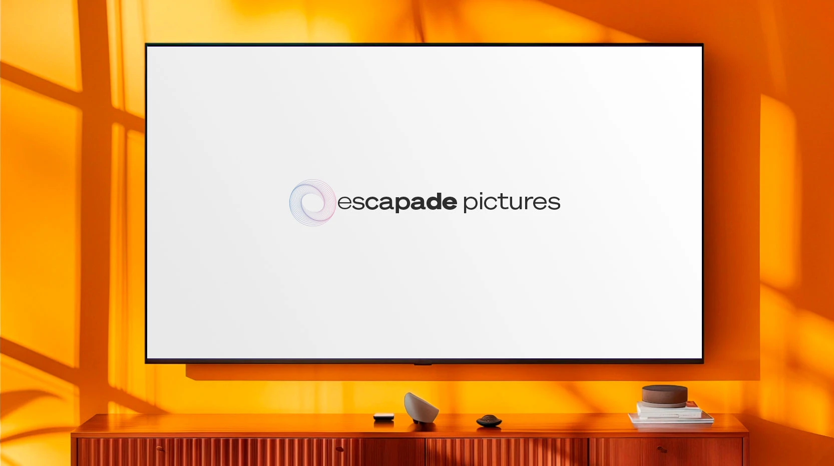 Escapade Pictures brand identity on TV mockup